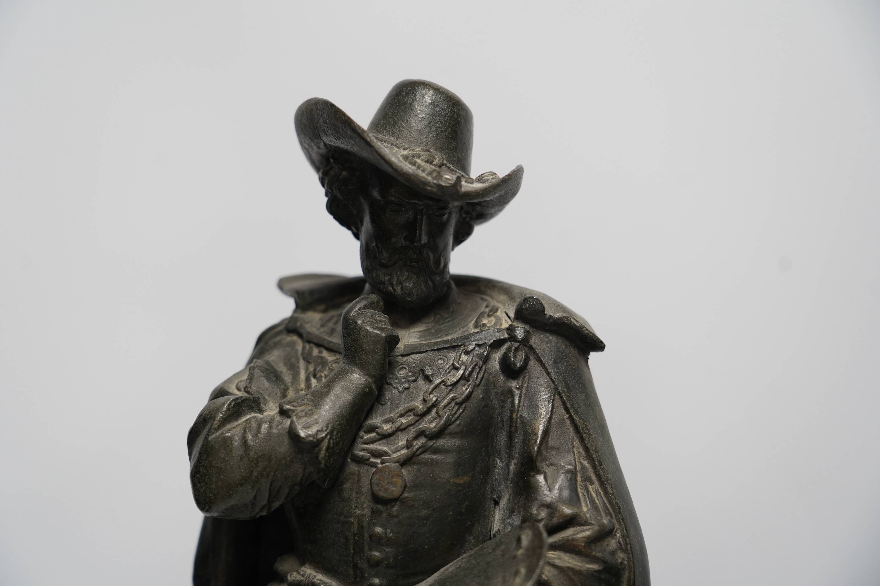 A pair of early 20th century spelter figures of cavaliers, 49cm